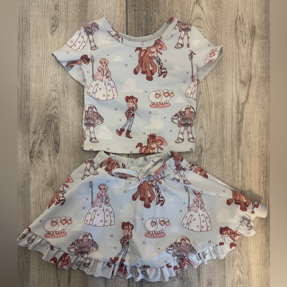 Made By Molly 5t Girls Two-Piece Toy Story Top & Ruffle Skort Set - Light Blue